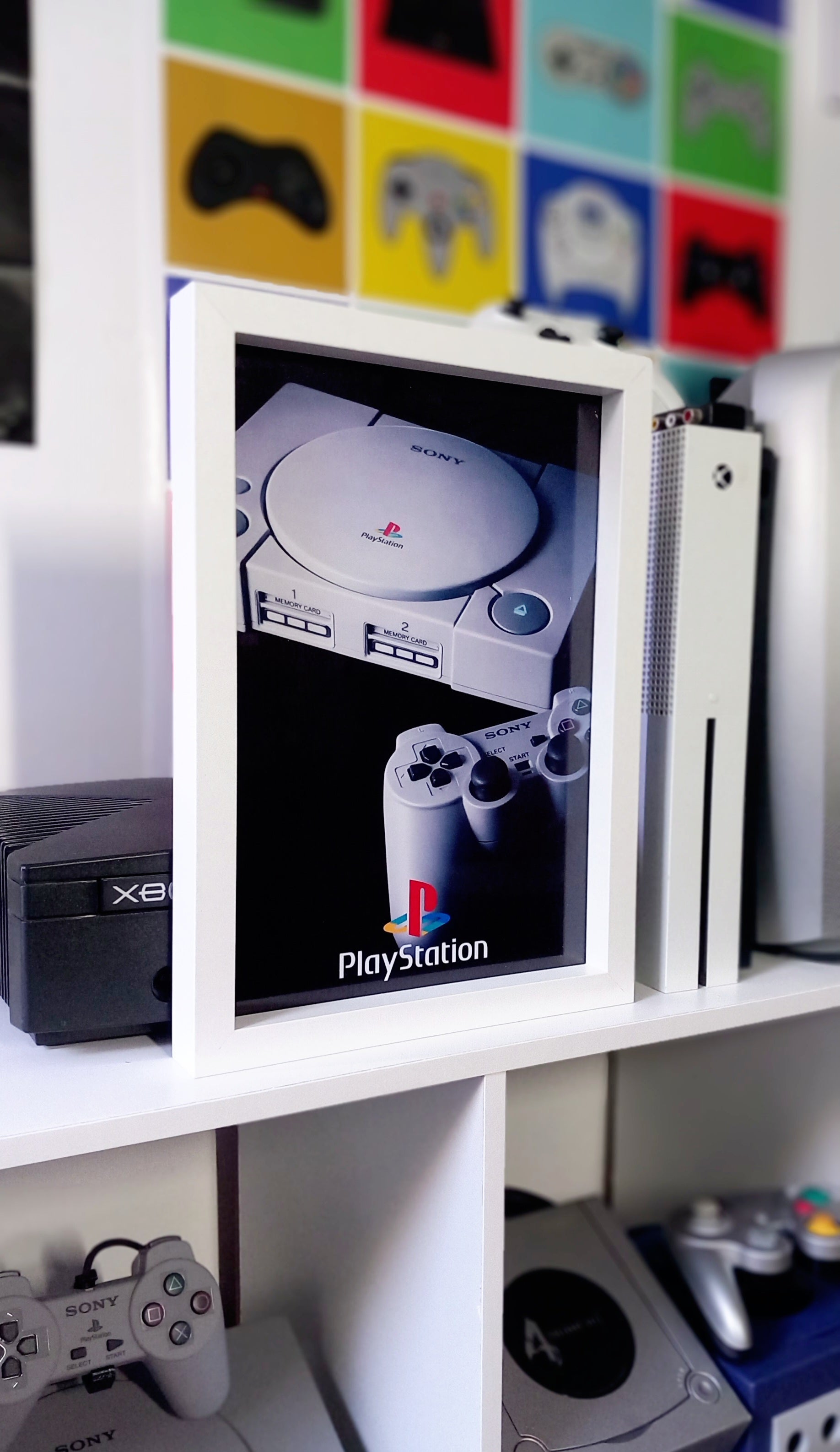 Cadre décoratif PlayStation 1 affiche publicitaire console manette DualShock Sony